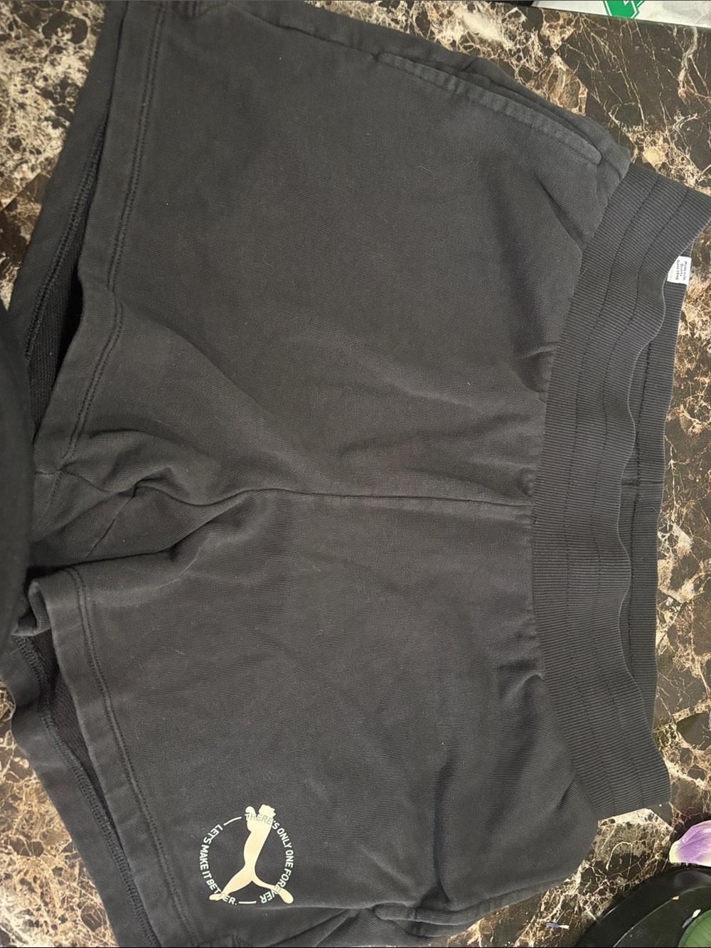 Puma Black Shorts with Pale Yellow Logo